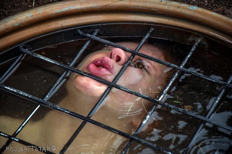 16P Rain DeGrey busty babe is tied and gagged outdoors