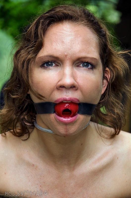16P Rain DeGrey busty babe is tied and gagged outdoors