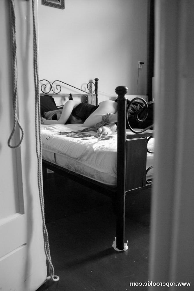 15P Hot blond tied up gagged on her bed with no escape.
