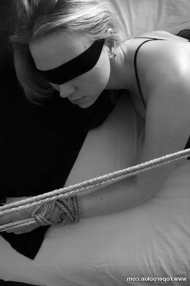 15P Hot blond tied up gagged on her bed with no escape.