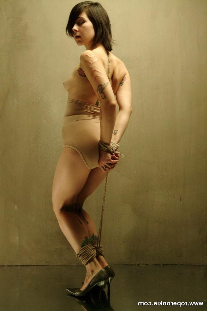 15P Scared babe in pantyhose bound and gagged.
