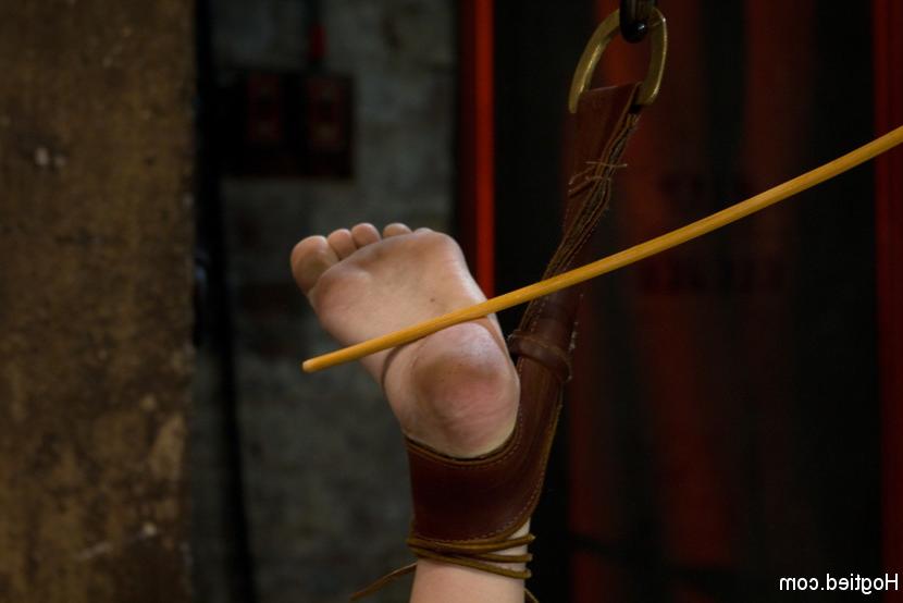15P Blond with killer natural body, is suspended, suffers intense foot caning Made t