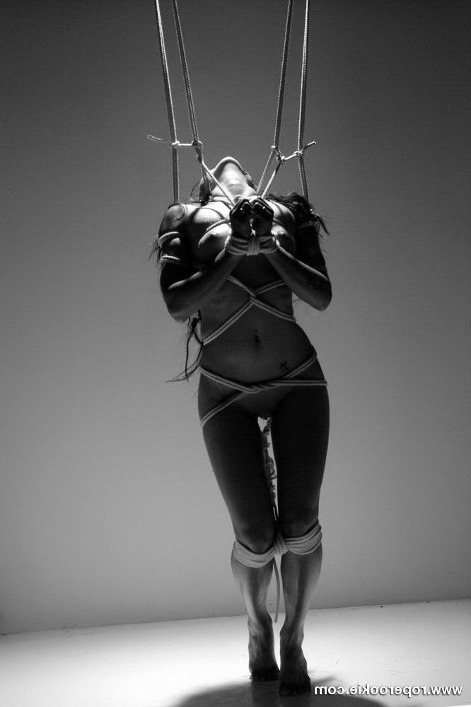 15P 15 hot pics of a girl tied bound and gagged.