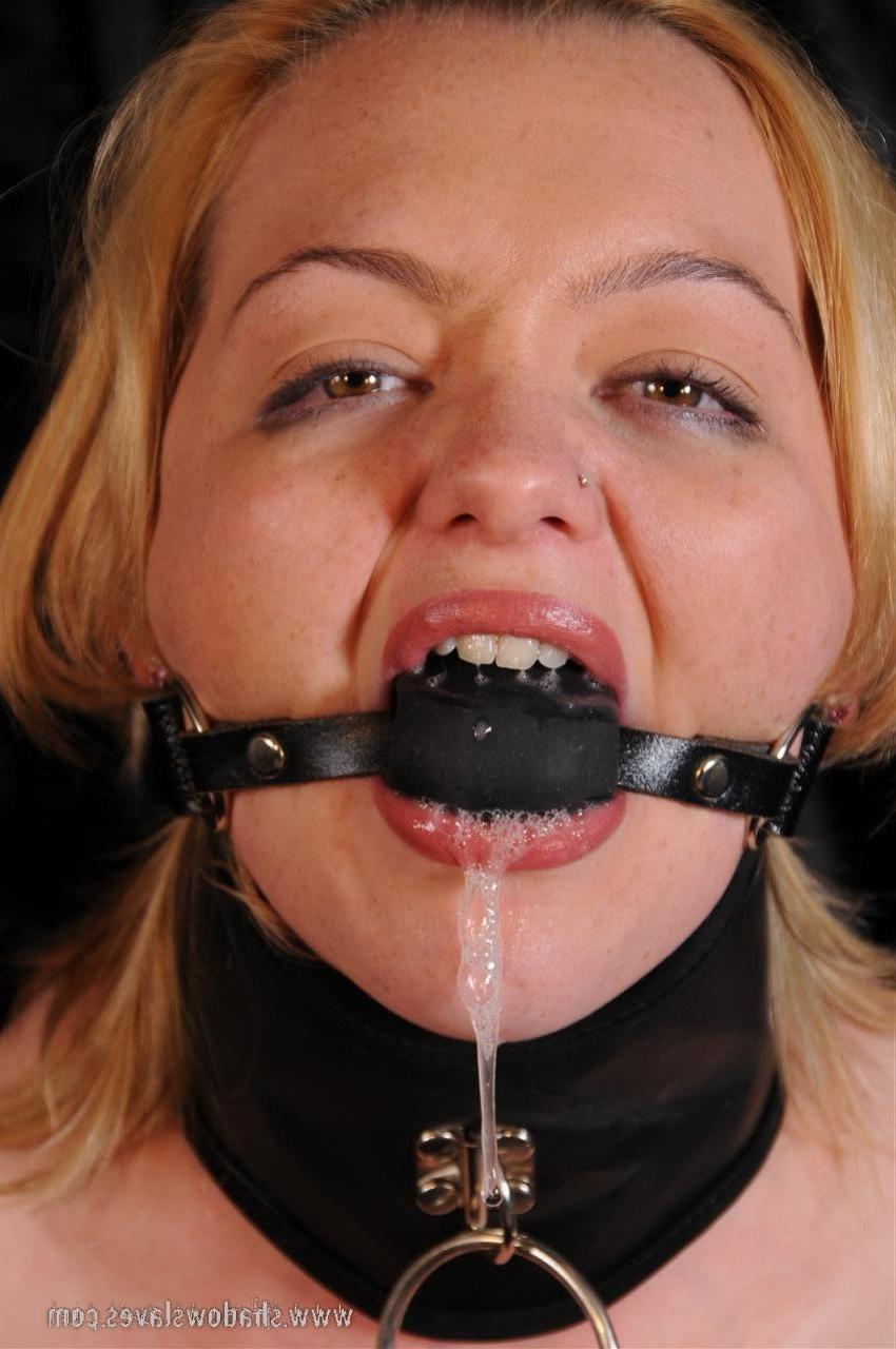 15P This cute blonde is bound in leather and rop and then gagged
