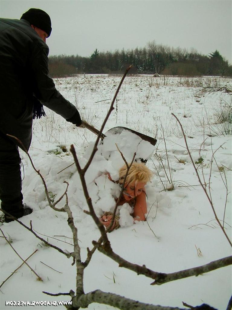 15P Blonde slave girl is gagged and buried naked in the cold snow