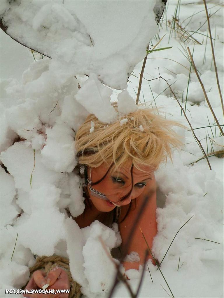 15P Blonde slave girl is gagged and buried naked in the cold snow
