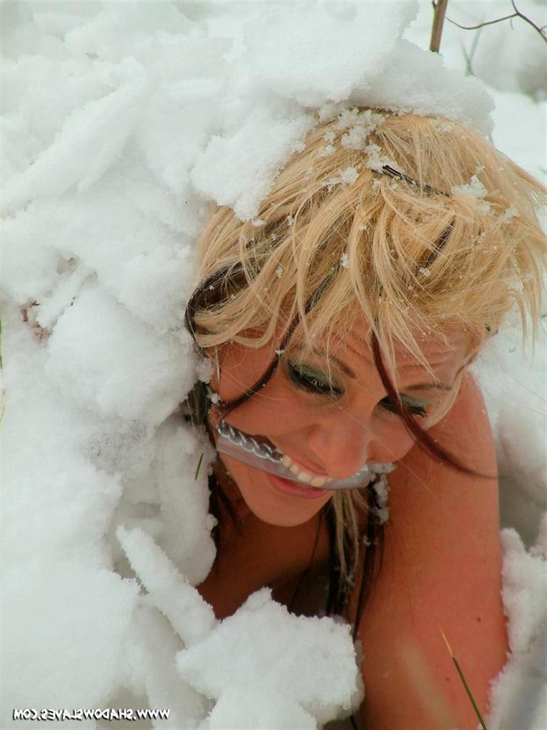 15P Blonde slave girl is gagged and buried naked in the cold snow