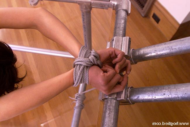 15P Gagged and suspended brunette slave