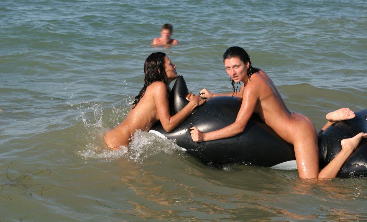 15P Check out this nudist showing off her shaved pussy