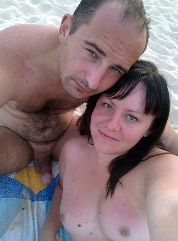 15P Check out this nudist showing off her shaved pussy