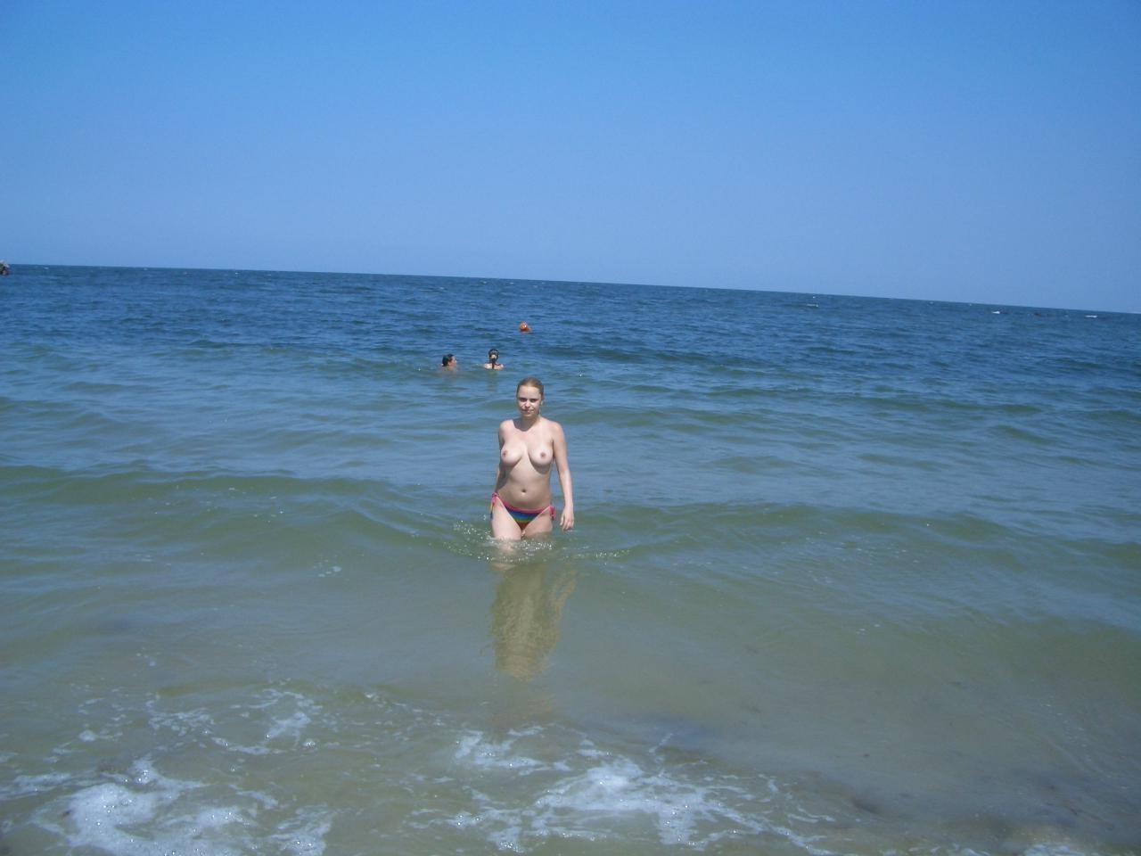 15P Look at this slim Russian nudist getting a tan