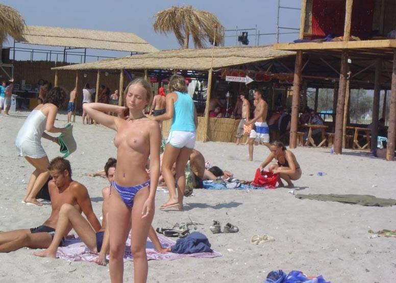 15P Naked teen nudist lets the water kiss her body