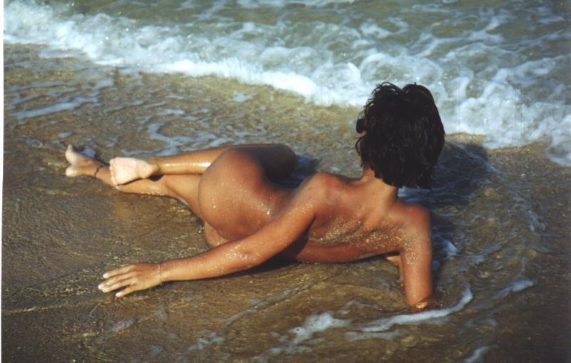 15P Gorgeous nudist blonde gets an all over tan