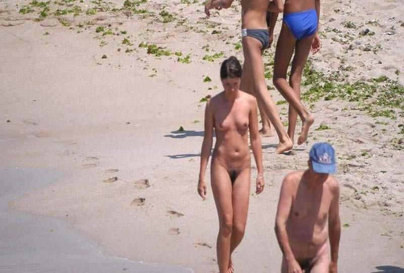 15P Watch the tits in the water from this nudist teen