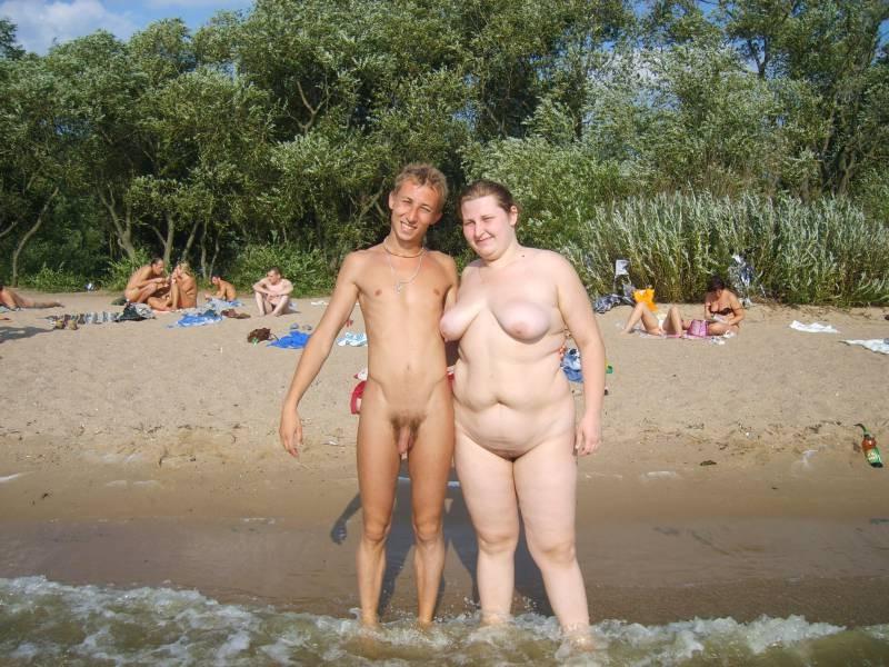 15P Check out this nudist showing off her shaved pussy
