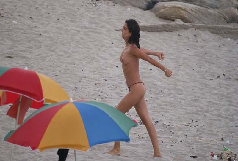 15P Raven haired goddess nudist shows off her body
