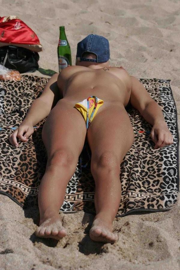 15P Naughty teen shows off her privates on the sand