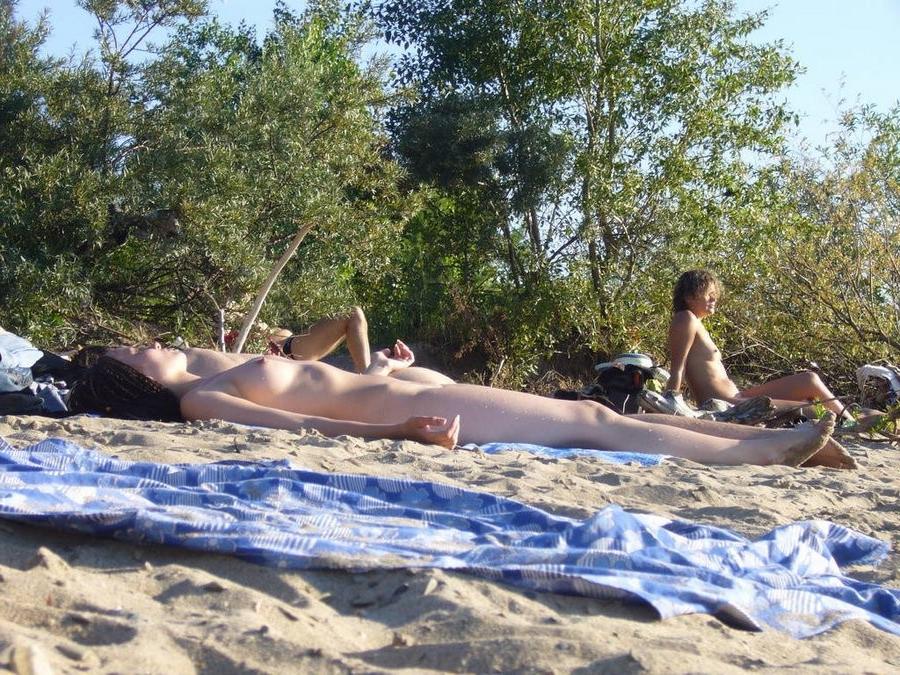 15P Brunette nudist loves feeling the sun on her body