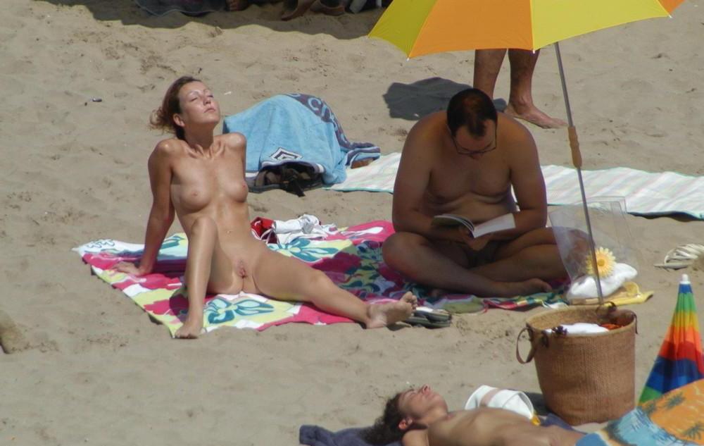 15P Look at this slim Russian nudist getting a tan
