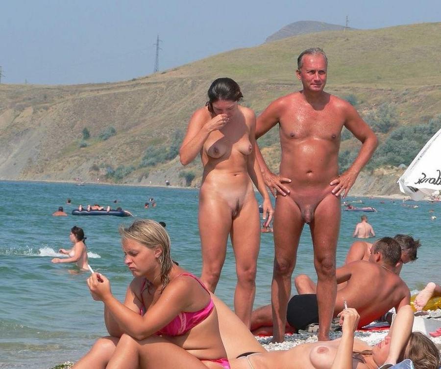 15P Look at this slim Russian nudist getting a tan