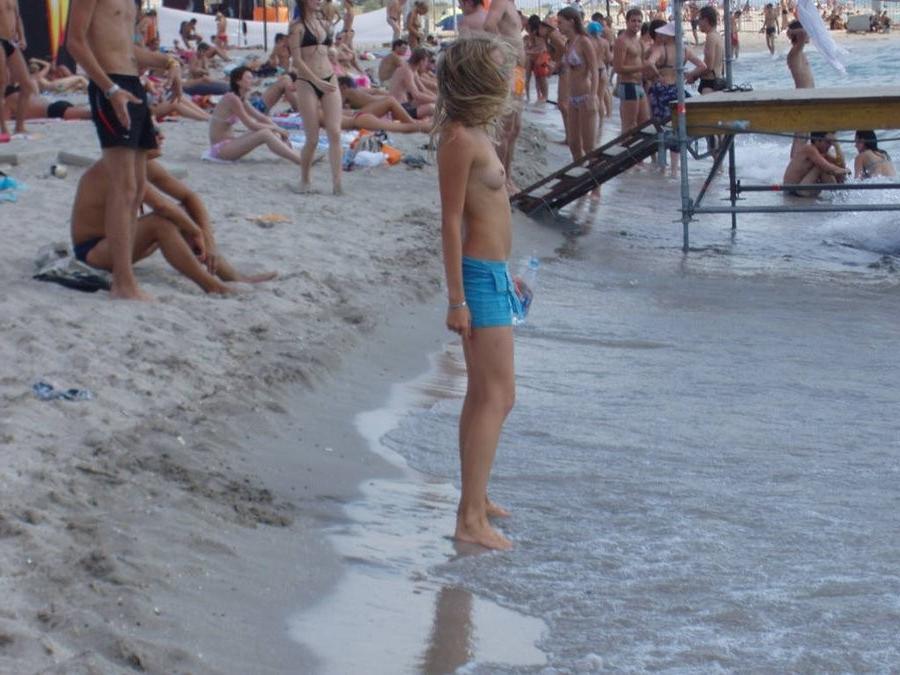 15P Look at this slim Russian nudist getting a tan