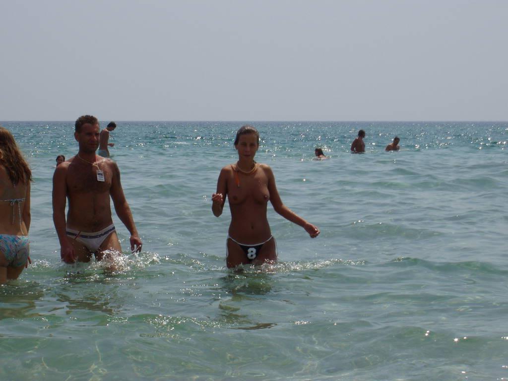 15P Look at this slim Russian nudist getting a tan