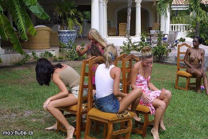 16P Some party girls play a game of musical chairs