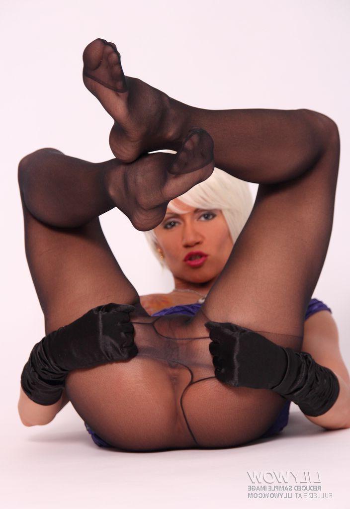 15P Leggy blonde Lily showes her perfect legs in black pantyhose
