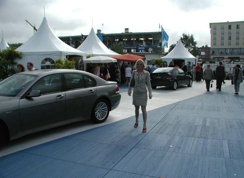 15P Pretty milf gives blowjob at BMW car show