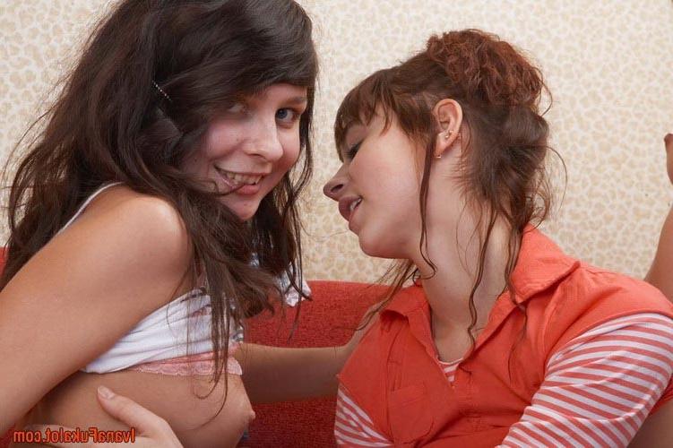 17P Three cute stunning girlfriends teasing together on the couch