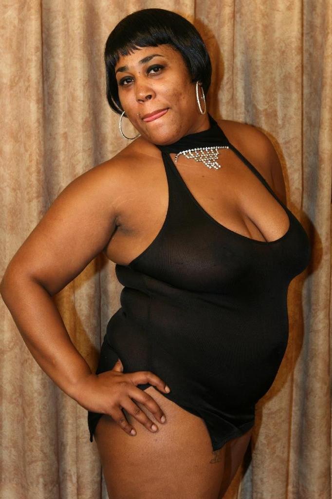 16P Horny ebony BBW Sasha showing off her huge belly while humping on top of a big b