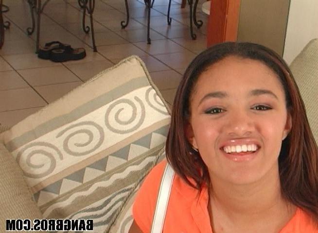 16P hot black chick looks over her shoulder while being banged