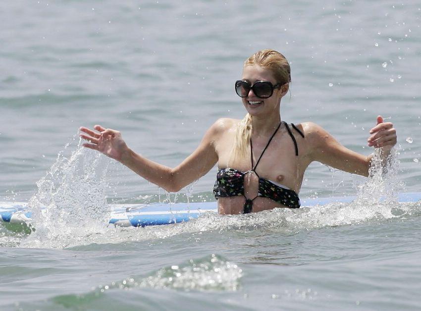 18P Sexy Paris Hilton dressed like a hooker and topless