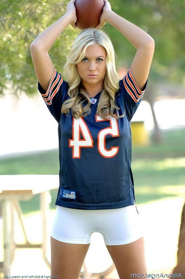 15P Busty Alison Angel playing football outside with camel toe