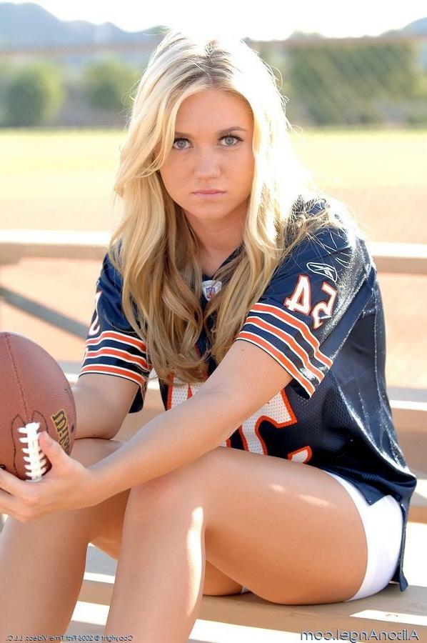 15P Busty Alison Angel playing football outside with camel toe