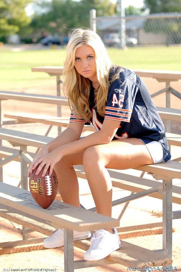 15P Busty Alison Angel playing football outside with camel toe