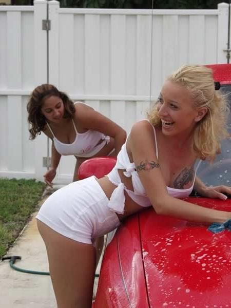 15P Two amateur girls playing and washing a car