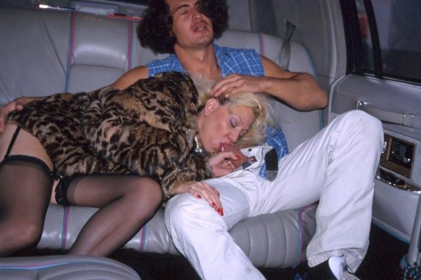 16P Kinky granny in stockings and fur coat blows hard cock in a limo