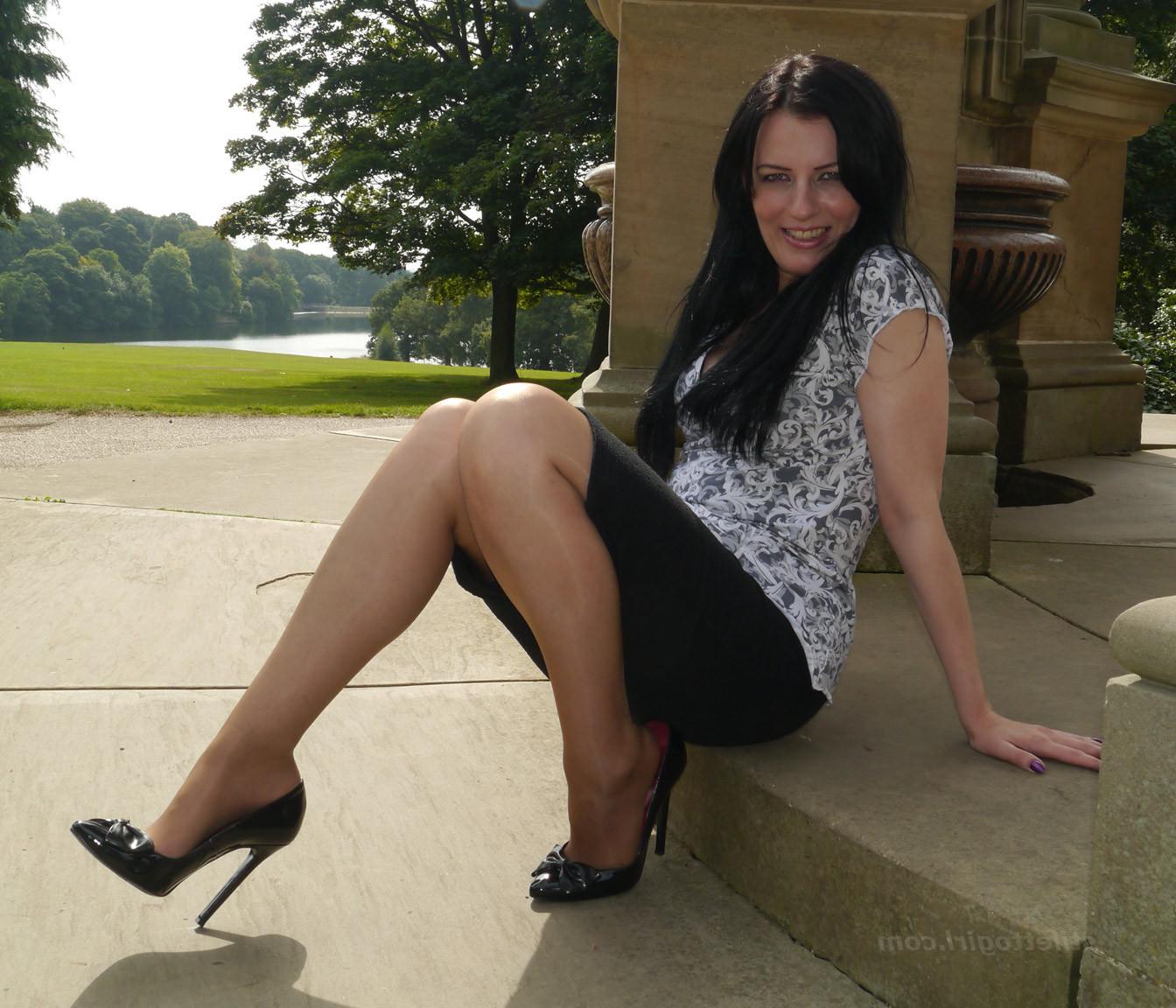 16P Leggy raven haired Milf is outdoors posing in her silky nylon st