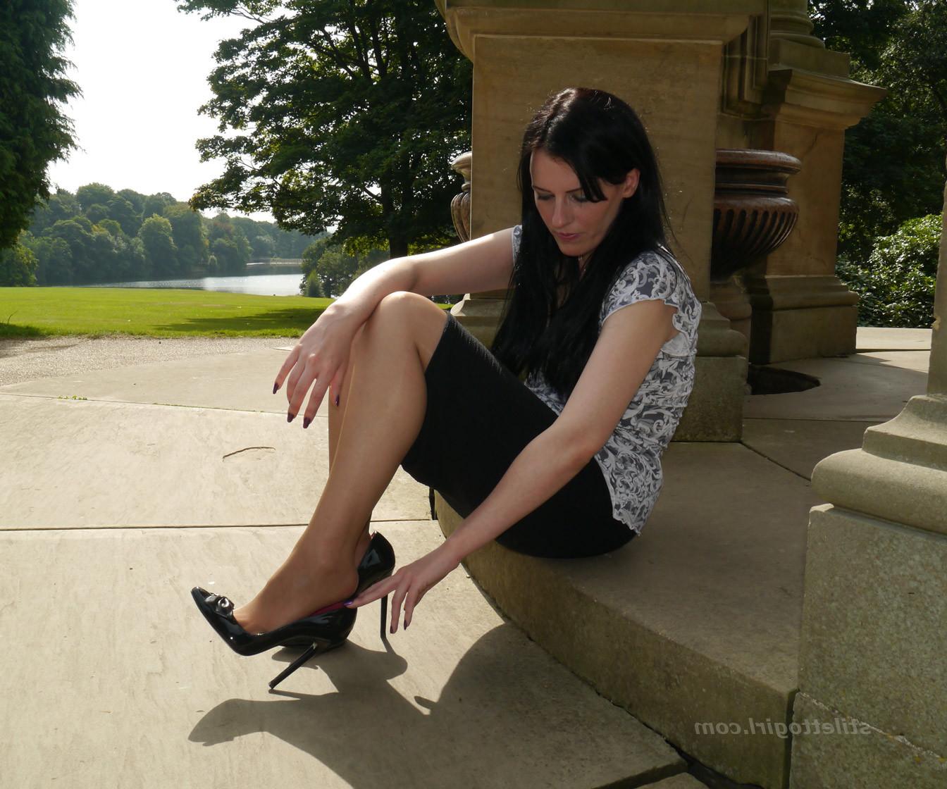 16P Leggy raven haired Milf is outdoors posing in her silky nylon st