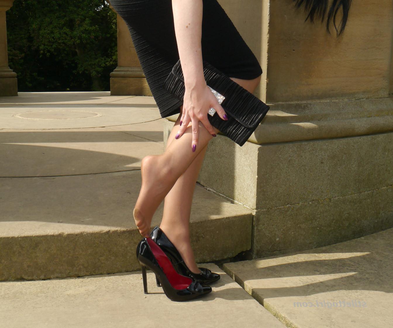 16P Leggy raven haired Milf is outdoors posing in her silky nylon st