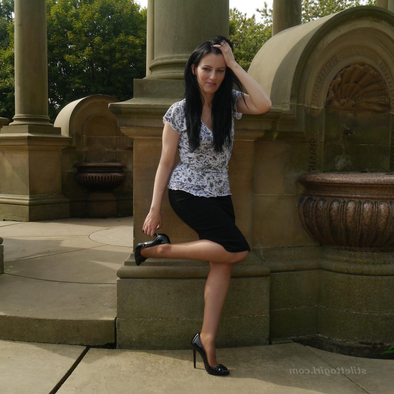 16P Leggy raven haired Milf is outdoors posing in her silky nylon st