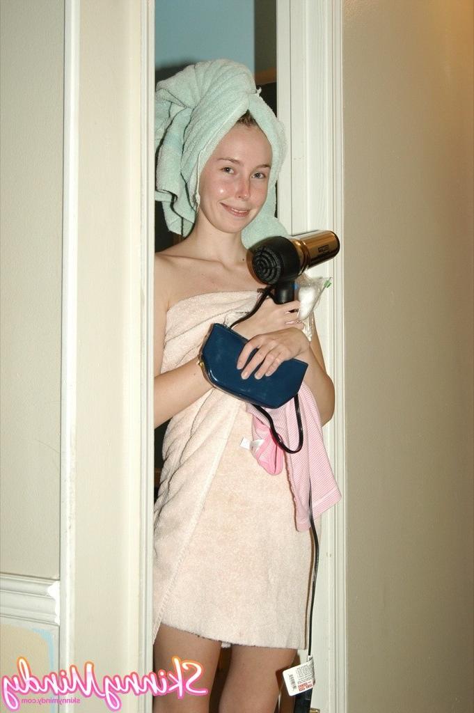 16P Skinny blow drying her hair