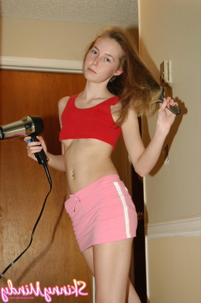 16P Skinny blow drying her hair