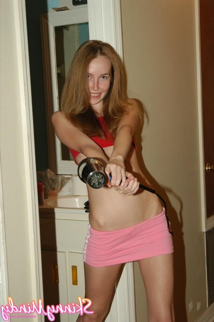 16P Skinny blow drying her hair