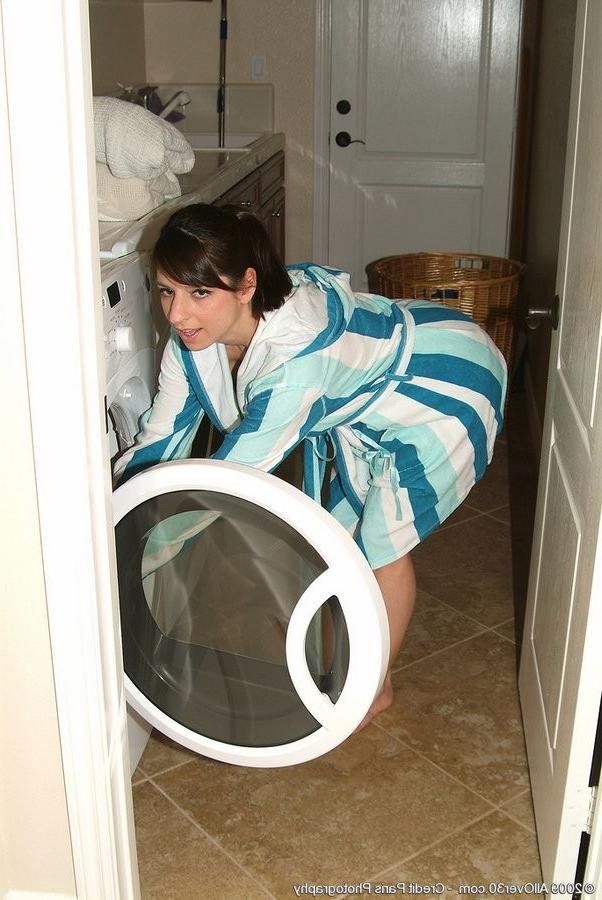 15P Yummy Housewife Disrobes And Spreads Her Legs To Show Her Pussy