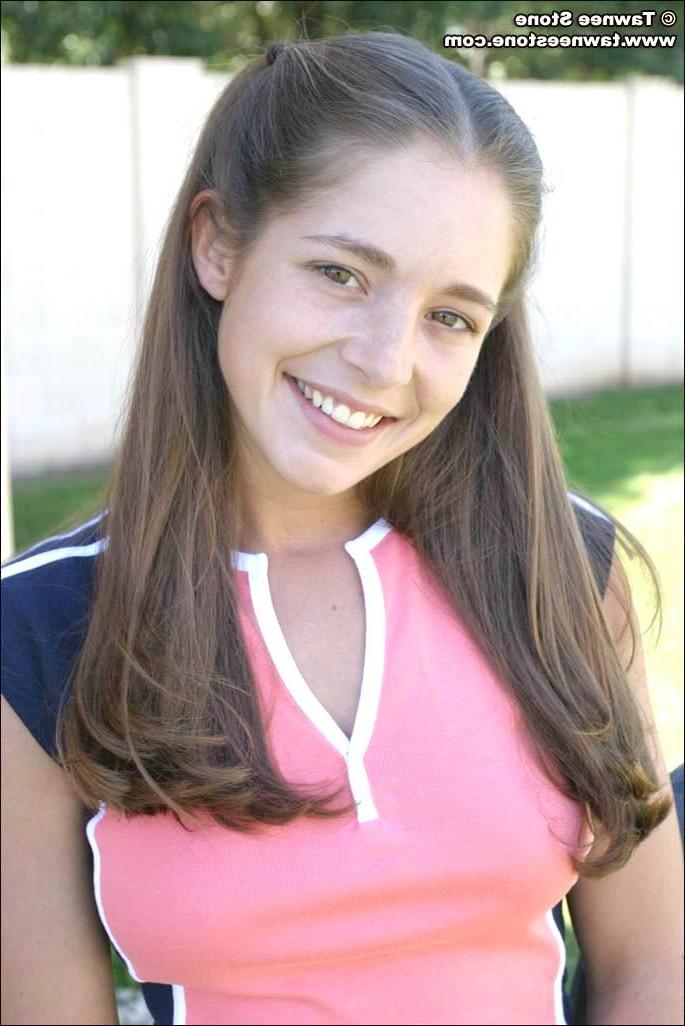 14P Tawnee Stone teases the camera in cute pink boy shorts