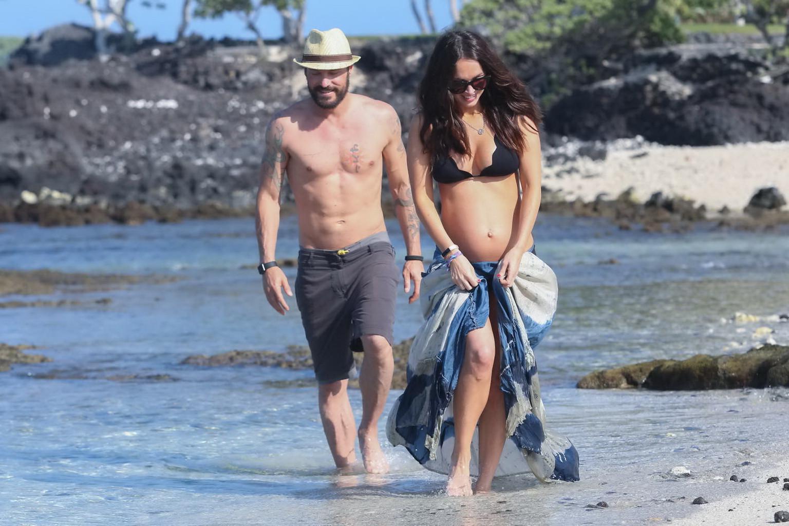 16P Megan Fox showing her boobs and big belly in black bikini