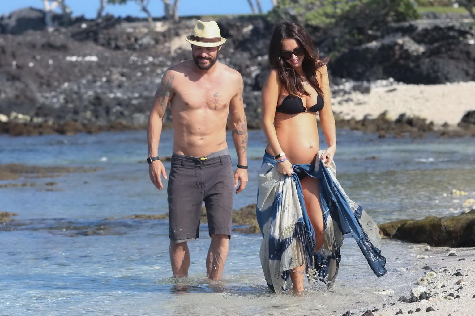 16P Megan Fox showing her boobs and big belly in black bikini