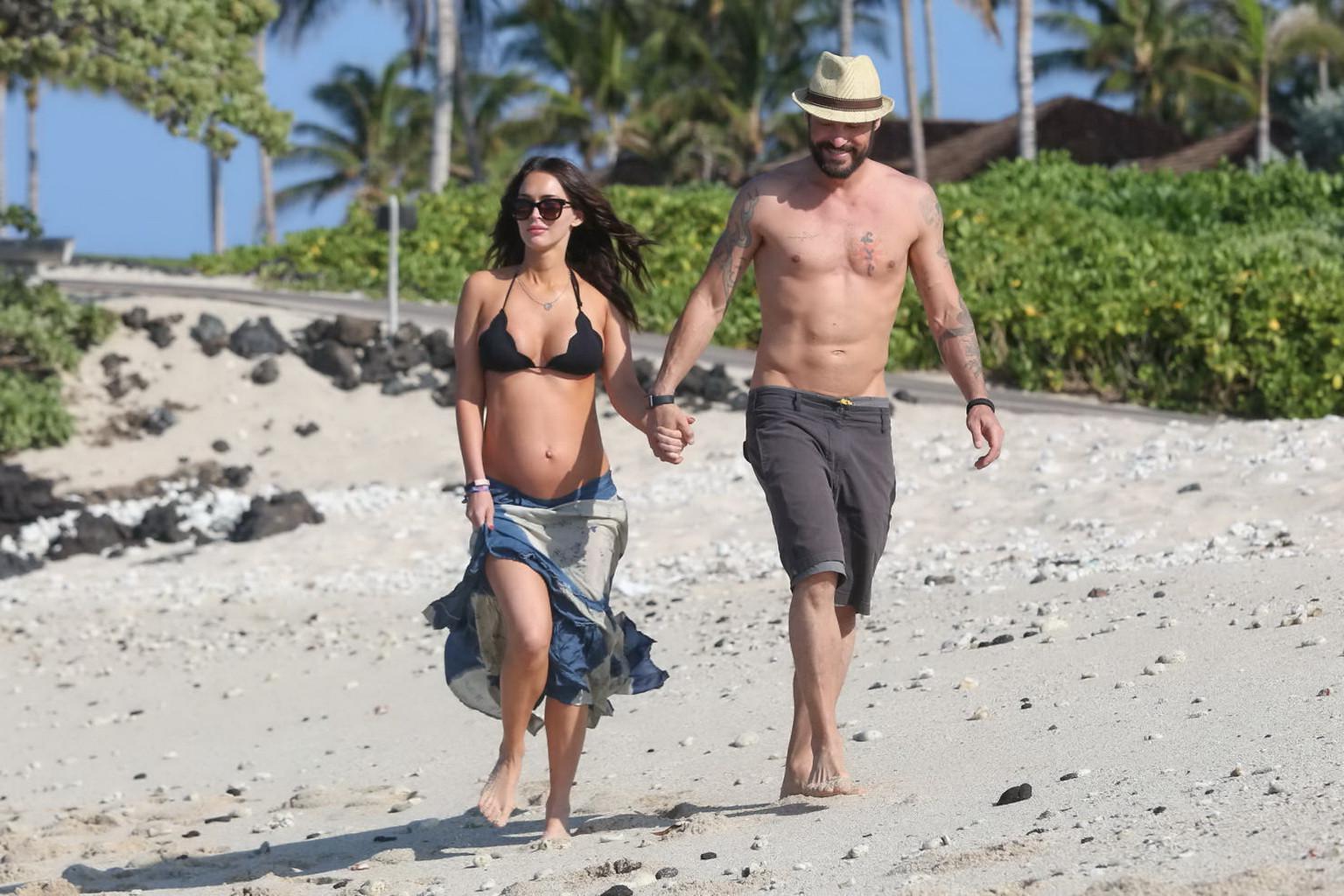16P Megan Fox showing her boobs and big belly in black bikini